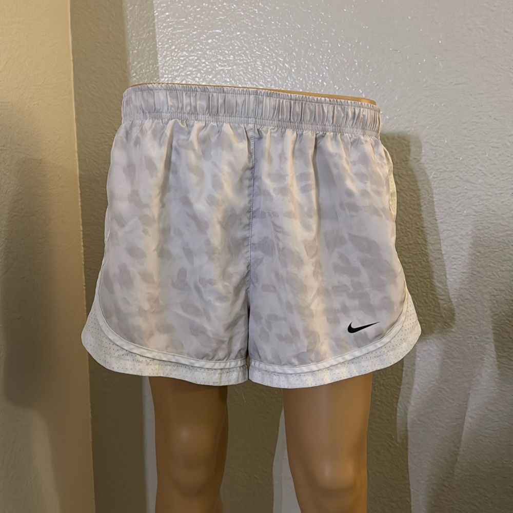 White Nike running shorts
